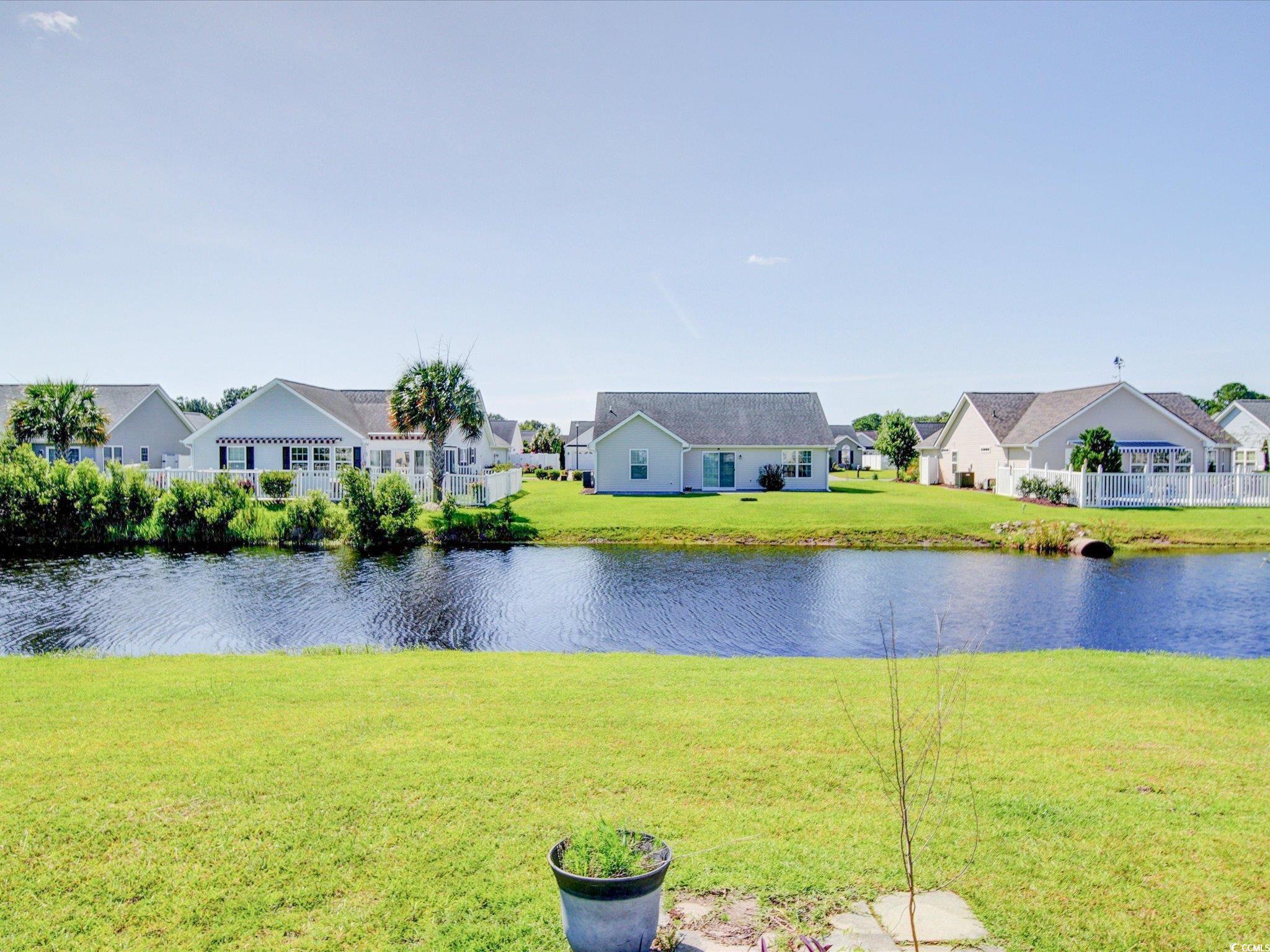 708 Shenanigan Loop Murrells Inlet, SC 29576 - Photo 3 of 20 Water view with nearby suburban area