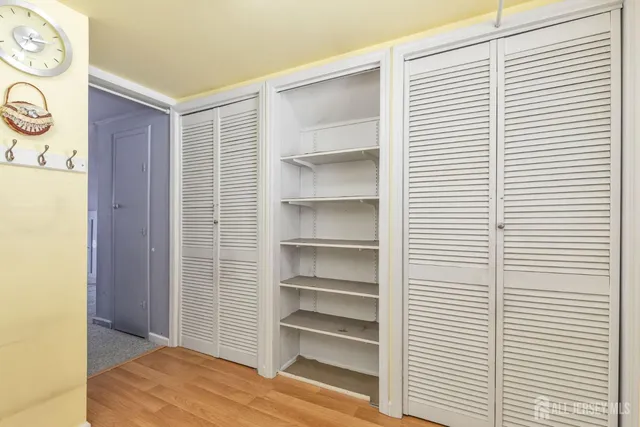 a view of a room that has a window in it