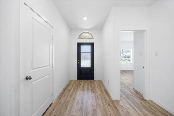 a view of entrance with wooden floor