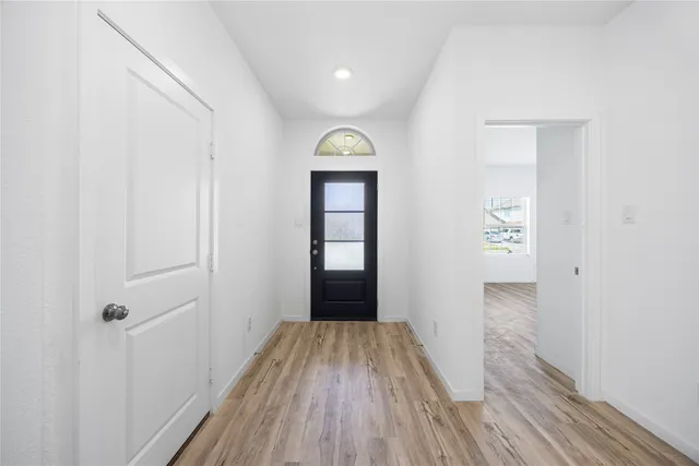 a view of entrance with wooden floor