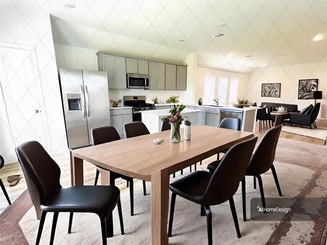 a dining room with stainless steel appliances a table chairs and a refrigerator