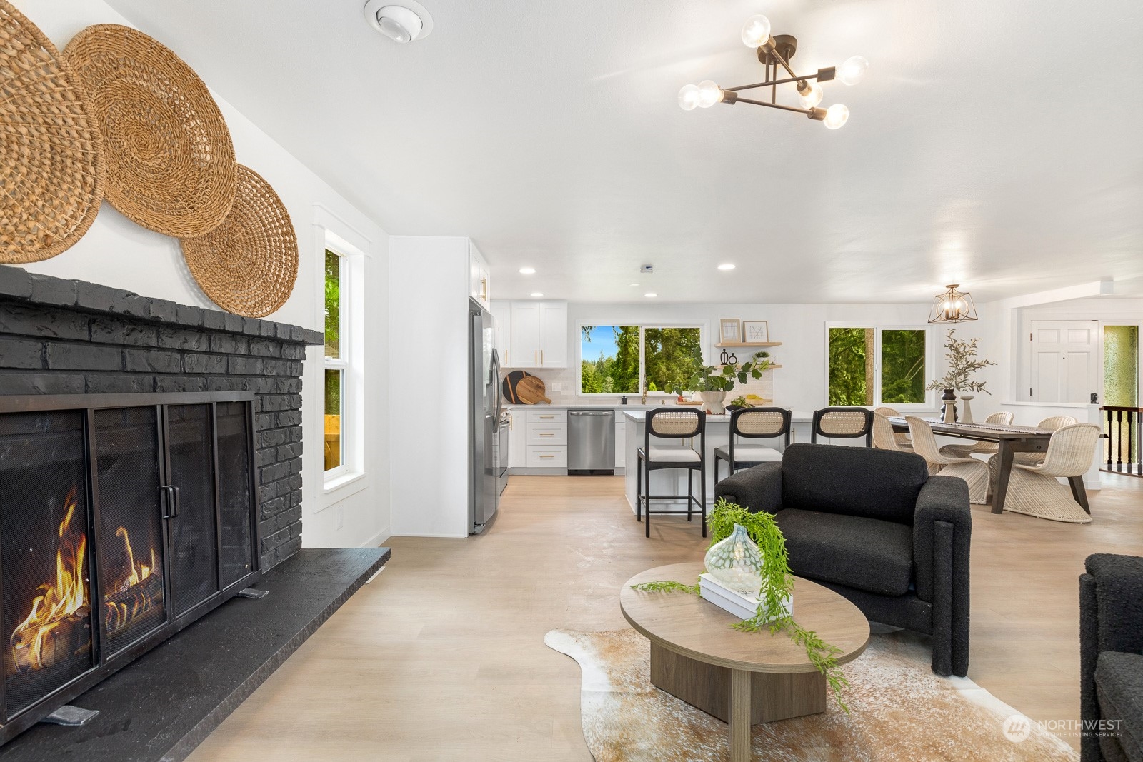 212 143rd Street Southeast Everett, WA 98208 - Photo 14 of 40 a living room with furniture and a fireplace