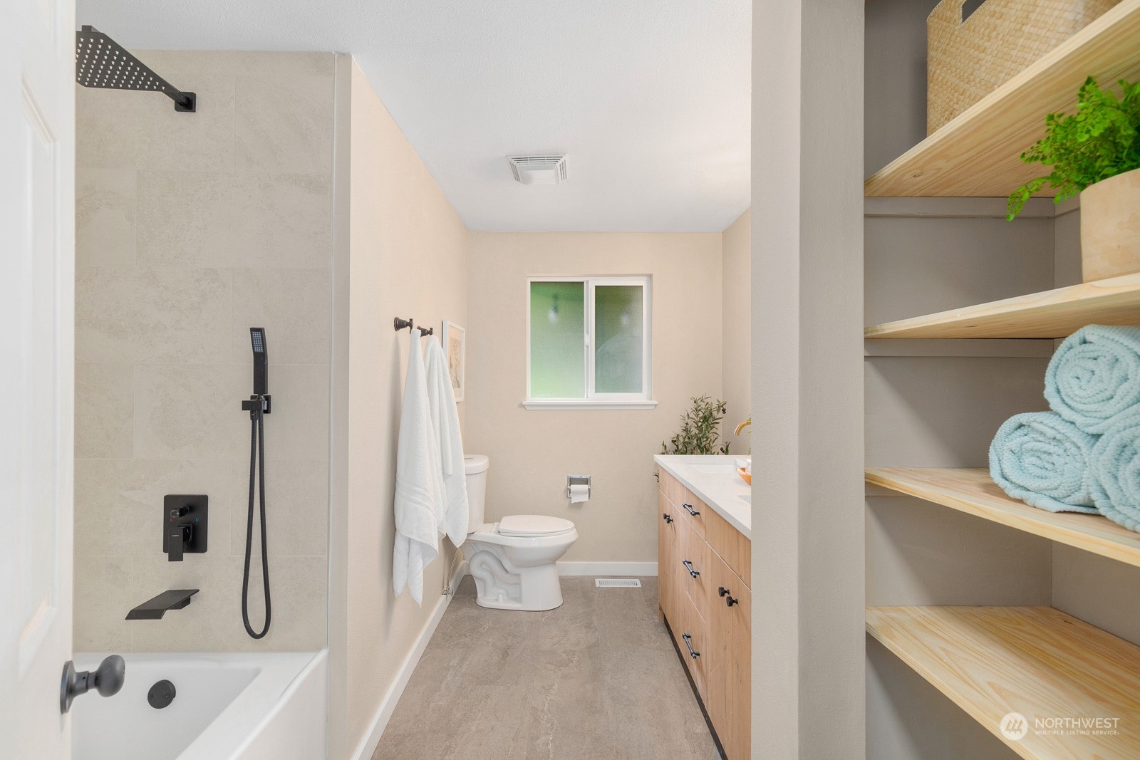 212 143rd Street Southeast Everett, WA 98208 - Photo 20 of 40 a bathroom with a sink a toilet and shower