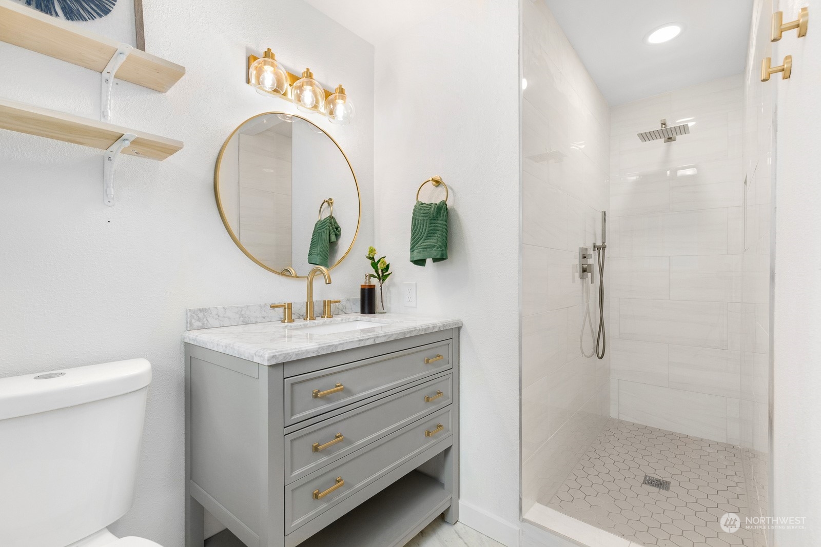 212 143rd Street Southeast Everett, WA 98208 - Photo 23 of 40 a bathroom with a sink a toilet and shower