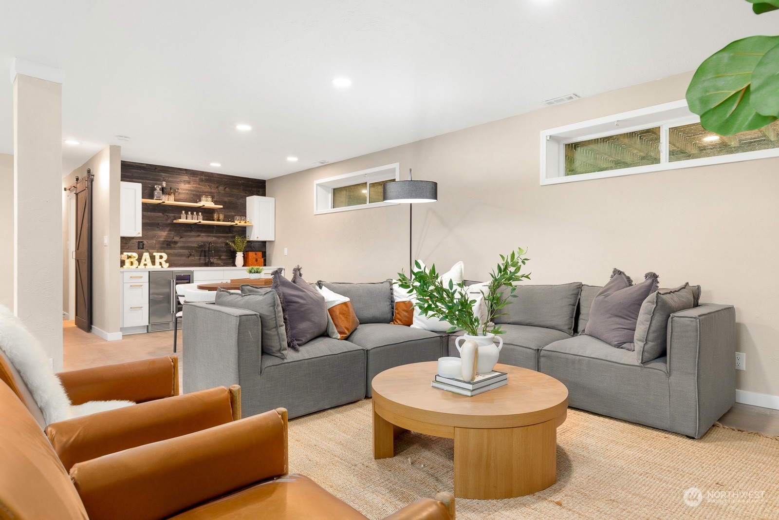 212 143rd Street Southeast Everett, WA 98208 - Photo 26 of 40 a living room with furniture a rug and kitchen view