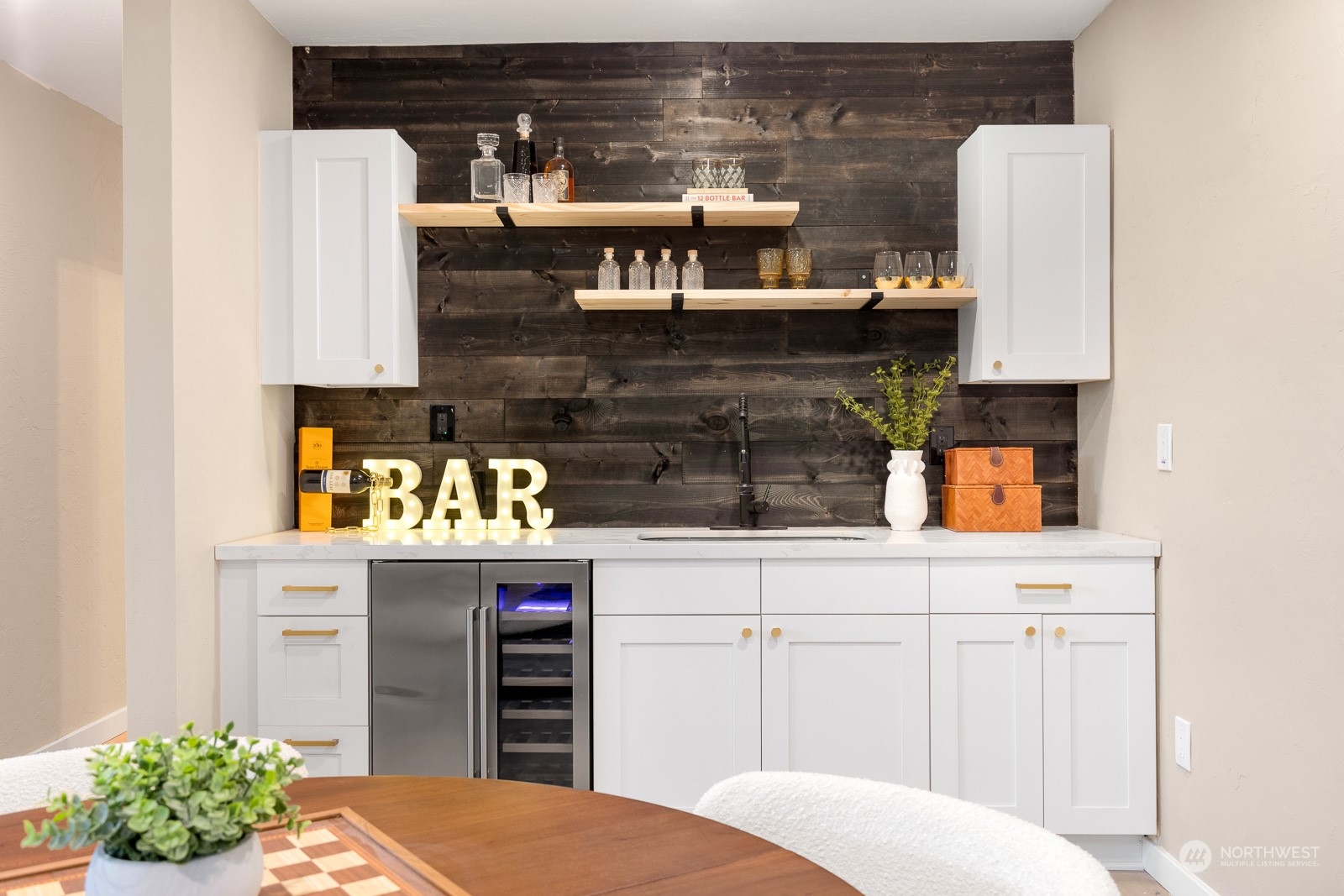 212 143rd Street Southeast Everett, WA 98208 - Photo 27 of 40 a kitchen with a refrigerator and cabinets