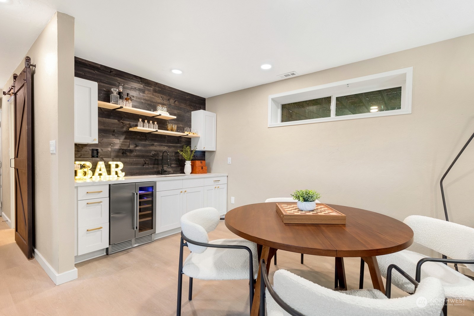 212 143rd Street Southeast Everett, WA 98208 - Photo 28 of 40 a kitchen with stainless steel appliances kitchen island granite countertop a sink and cabinets