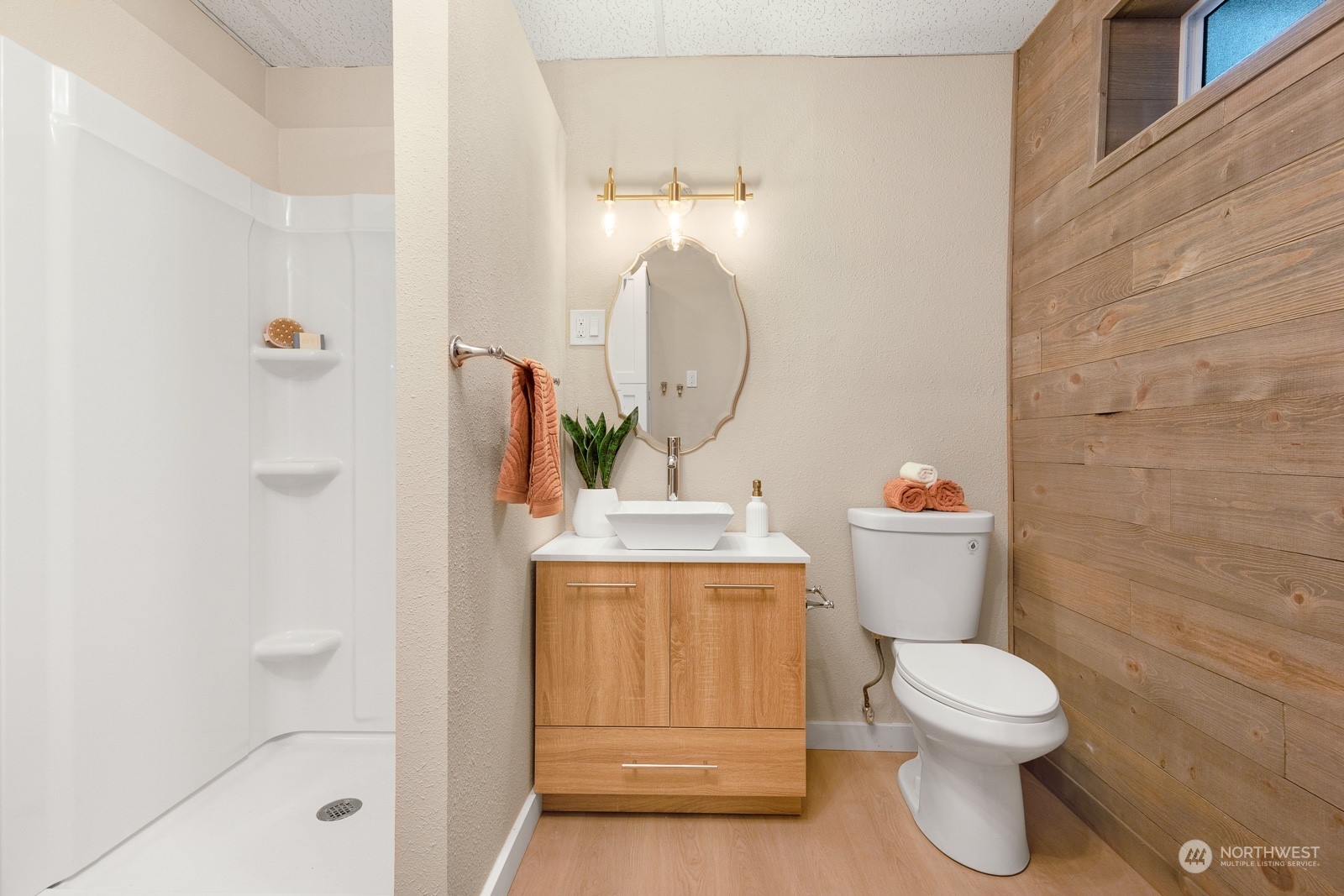 212 143rd Street Southeast Everett, WA 98208 - Photo 29 of 40 a bathroom with a toilet a sink and mirror