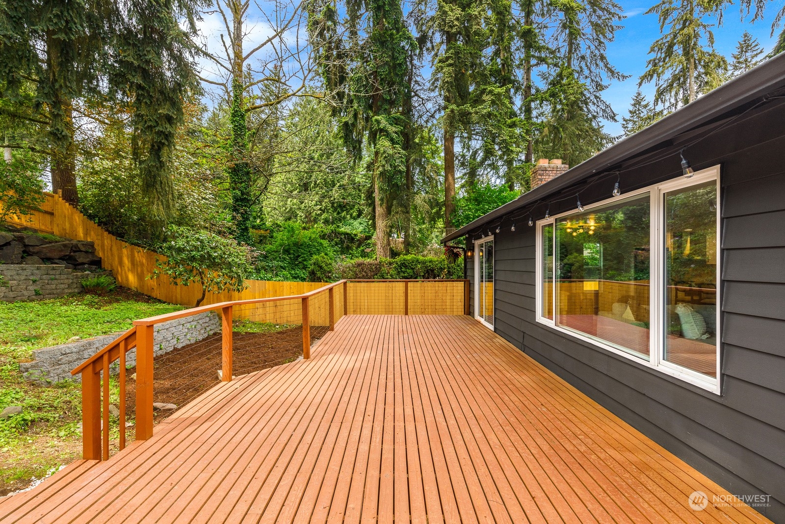 212 143rd Street Southeast Everett, WA 98208 - Photo 30 of 40 a view of balcony with a large window and wooden floor