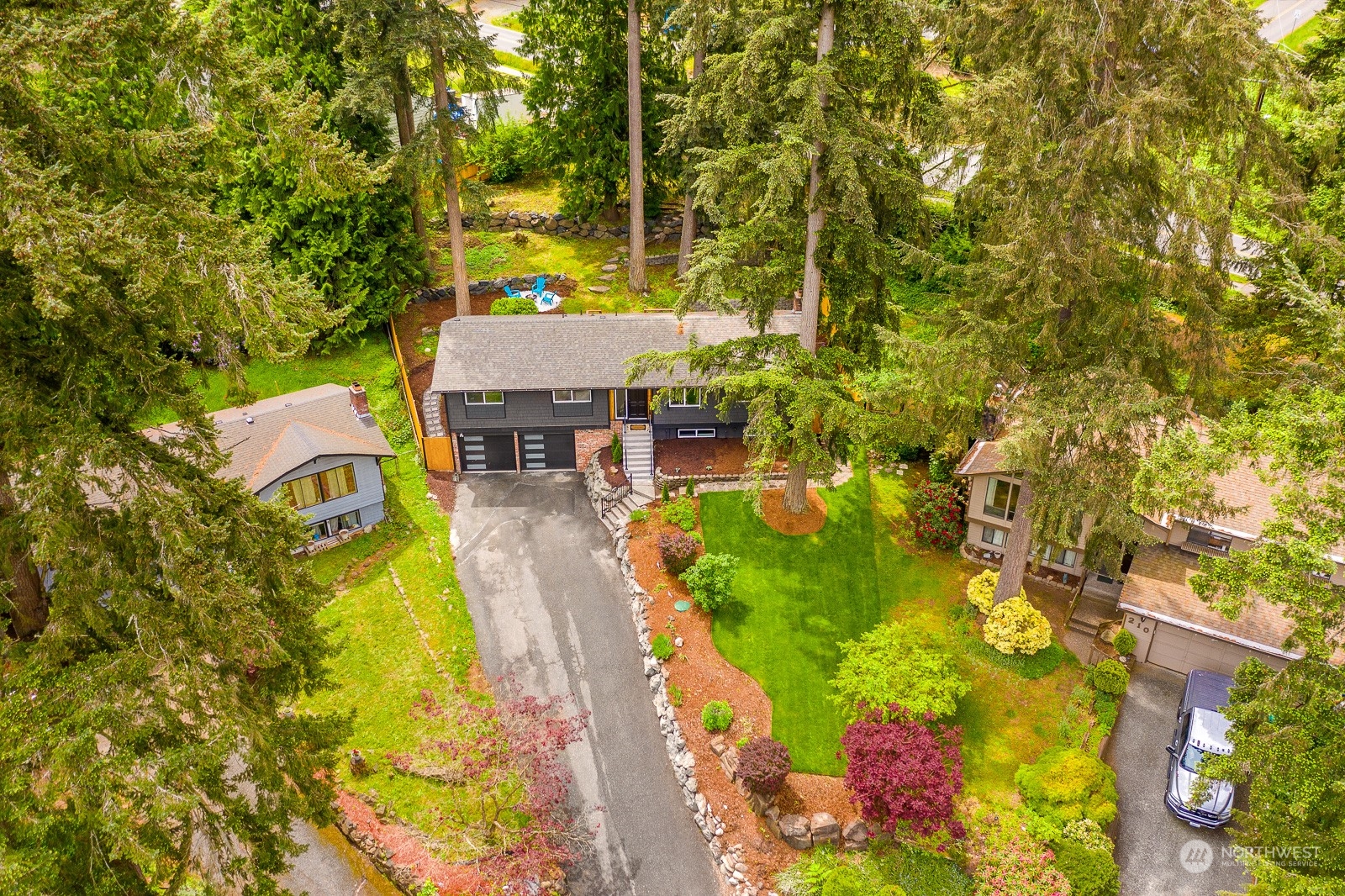 212 143rd Street Southeast Everett, WA 98208 - Photo 39 of 40 a aerial view of a house with swimming pool and large trees