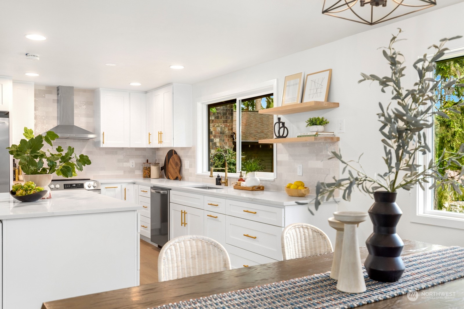 212 143rd Street Southeast Everett, WA 98208 - Photo 8 of 40 a kitchen with a sink appliances and cabinets