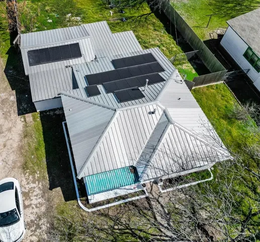 a view of barbeque area with seating