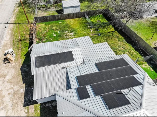 a view of balcony with wooden floor