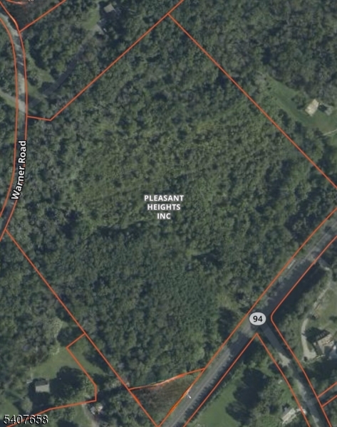 a view of balcony with wooden floor