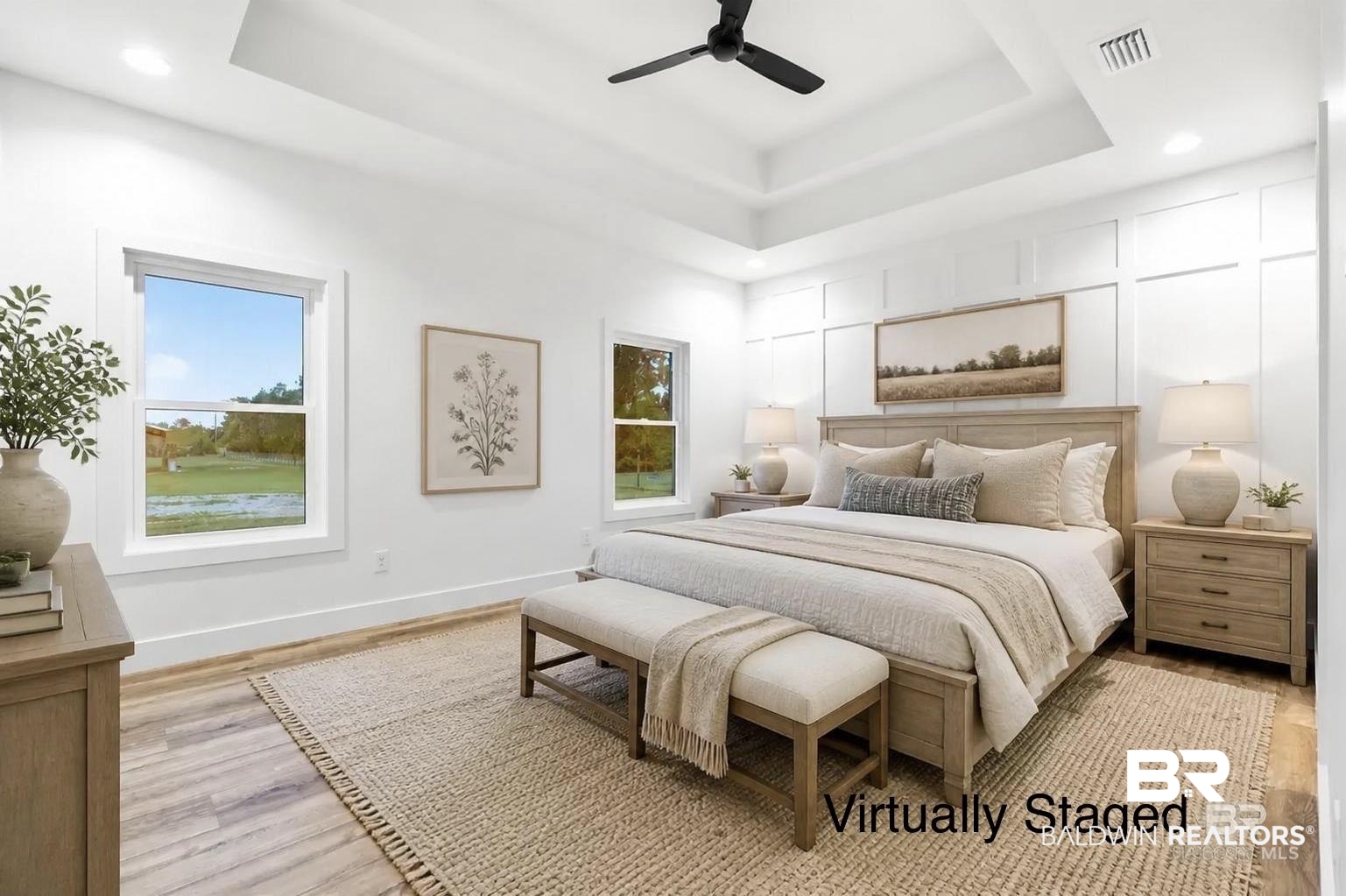 28310 Comstock Road Elberta, AL 36530 - Photo 6 of 60 Virtually Staged - Spacious Primary room featuring wood-finish flooring, a tray ceiling with recessed lighting, and a black ceiling fan