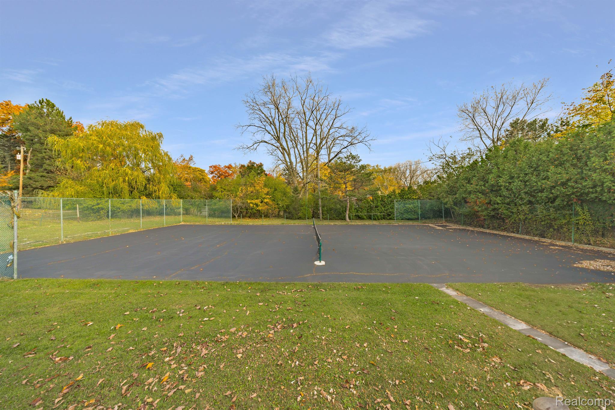 5731 Farmington Road West Bloomfield, MI 48322 - Photo 42 of 54 Yard Looking East Tennis/Pickle Ball Court