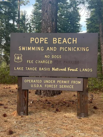 a sign that is on the side of a road