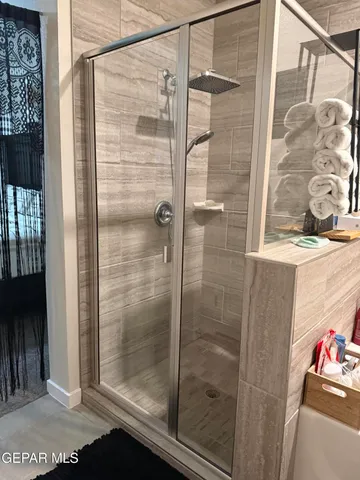 a view of bathroom with dual sinks