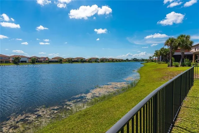 a view of a lake from a balcony