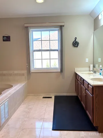 a kitchen with a sink a counter top space and appliances