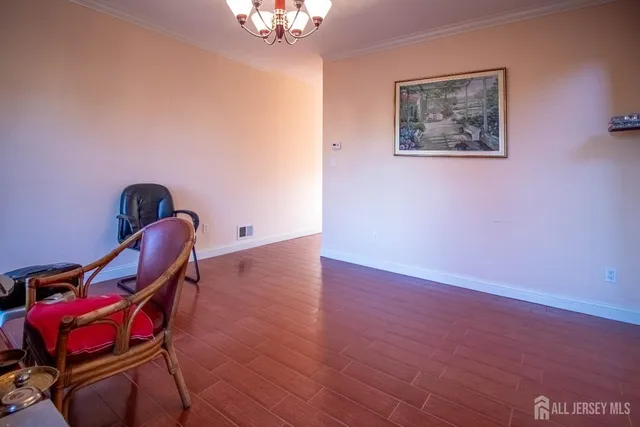 wooden floor with a bookshelf