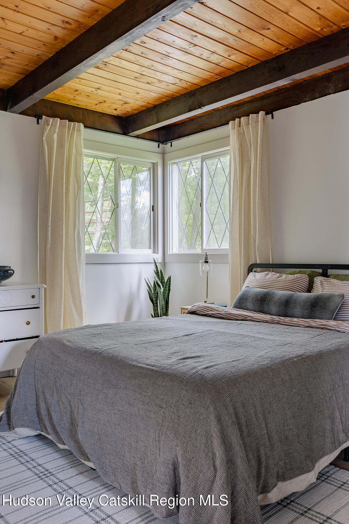 38 Cambridge Heights Road Windham, NY 12496 - Photo 12 of 29 a bedroom with a bed and a window