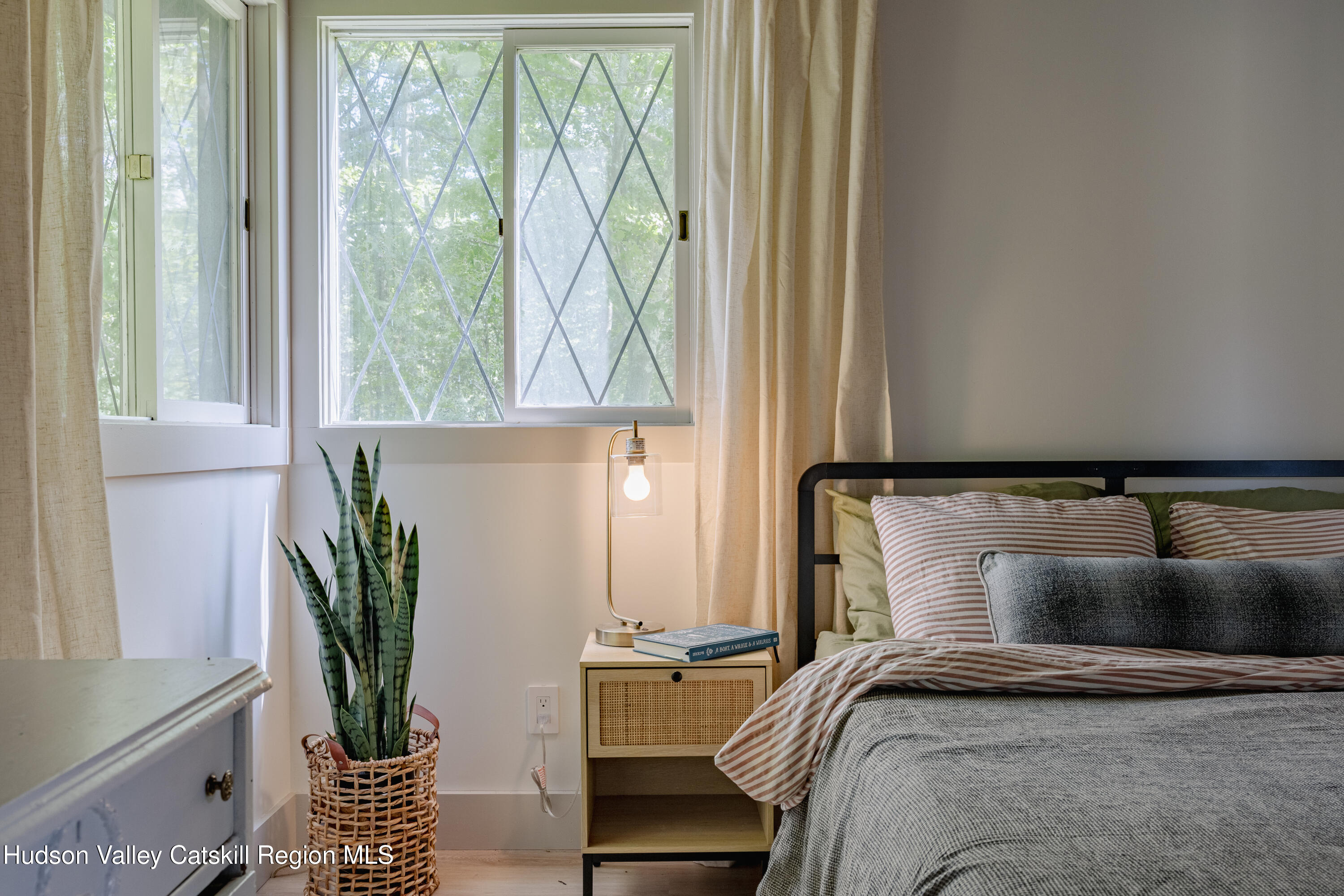 38 Cambridge Heights Road Windham, NY 12496 - Photo 13 of 29 a bedroom with a bed and a window