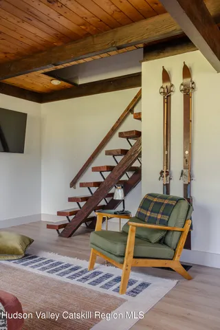 a view of staircase with wooden floor