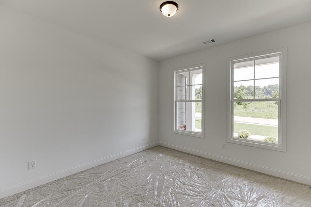 1123 Poppy Lane Jefferson, GA 30549 - Photo 11 of 45 an empty room with windows