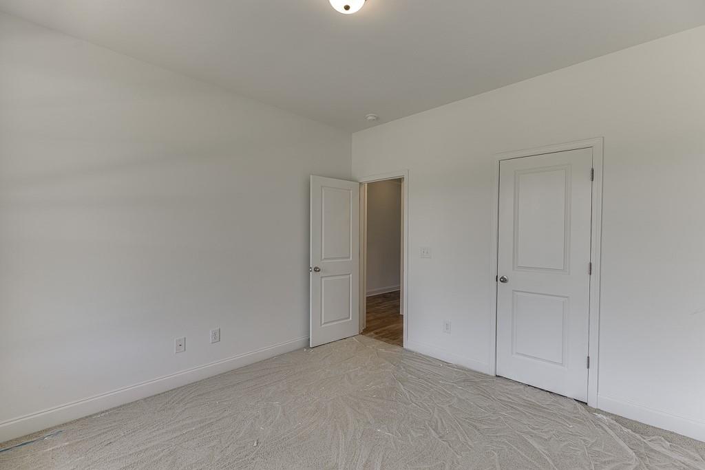 1123 Poppy Lane Jefferson, GA 30549 - Photo 12 of 45 a view of an empty room