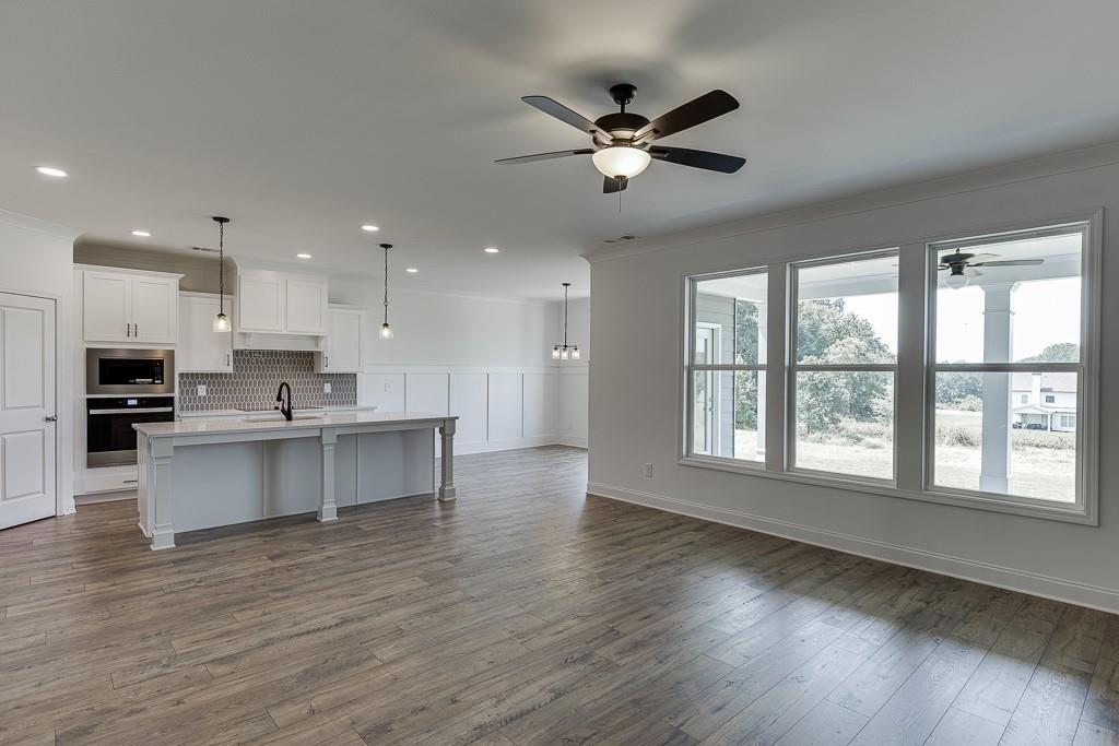1123 Poppy Lane Jefferson, GA 30549 - Photo 26 of 45 a view of an empty room with kitchen appliances and a window