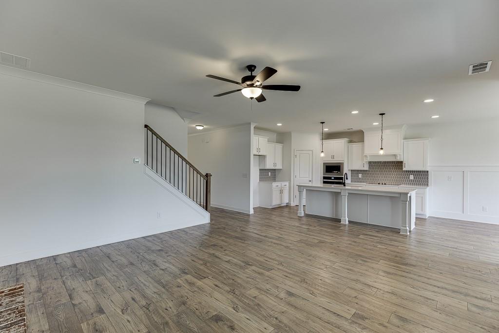 1123 Poppy Lane Jefferson, GA 30549 - Photo 27 of 45 a view of kitchen with wooden floor and a kitchen space