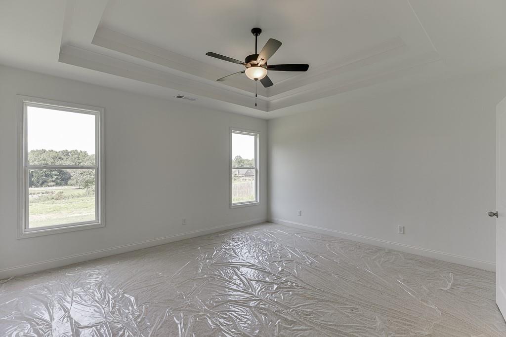 1123 Poppy Lane Jefferson, GA 30549 - Photo 28 of 45 a view of an empty room with a window