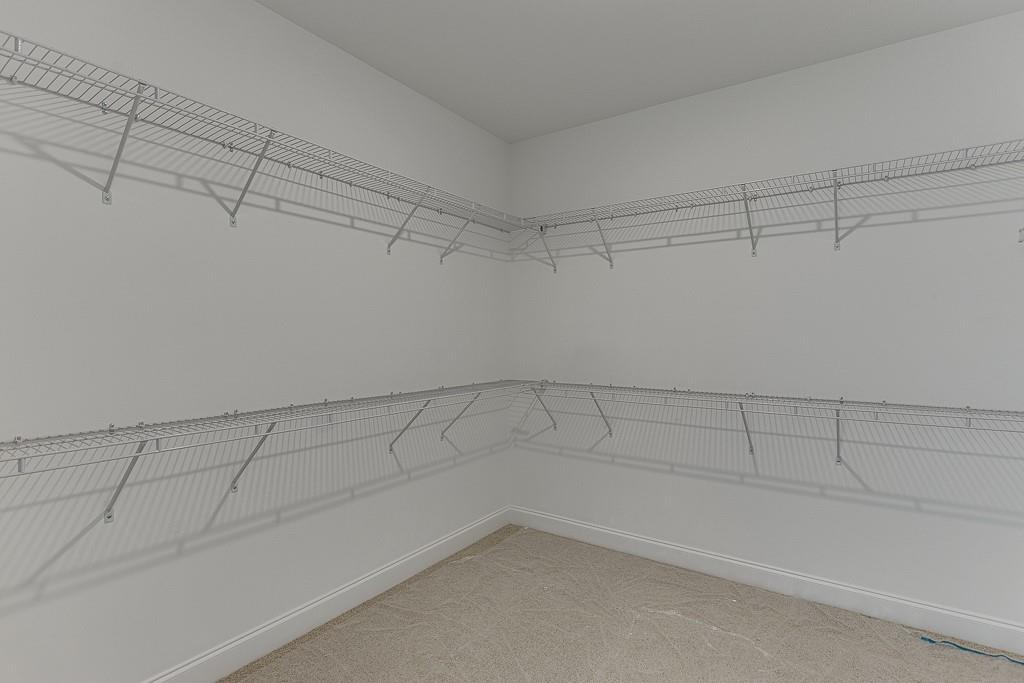 1123 Poppy Lane Jefferson, GA 30549 - Photo 35 of 45 a view of a room with racks on the wall