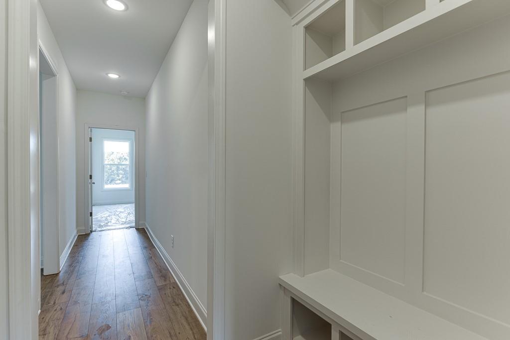 1123 Poppy Lane Jefferson, GA 30549 - Photo 37 of 45 a view of hallway with wooden floor