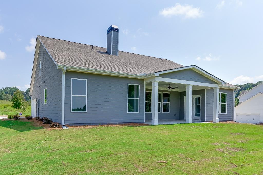 1123 Poppy Lane Jefferson, GA 30549 - Photo 43 of 45 a front view of a house with garden