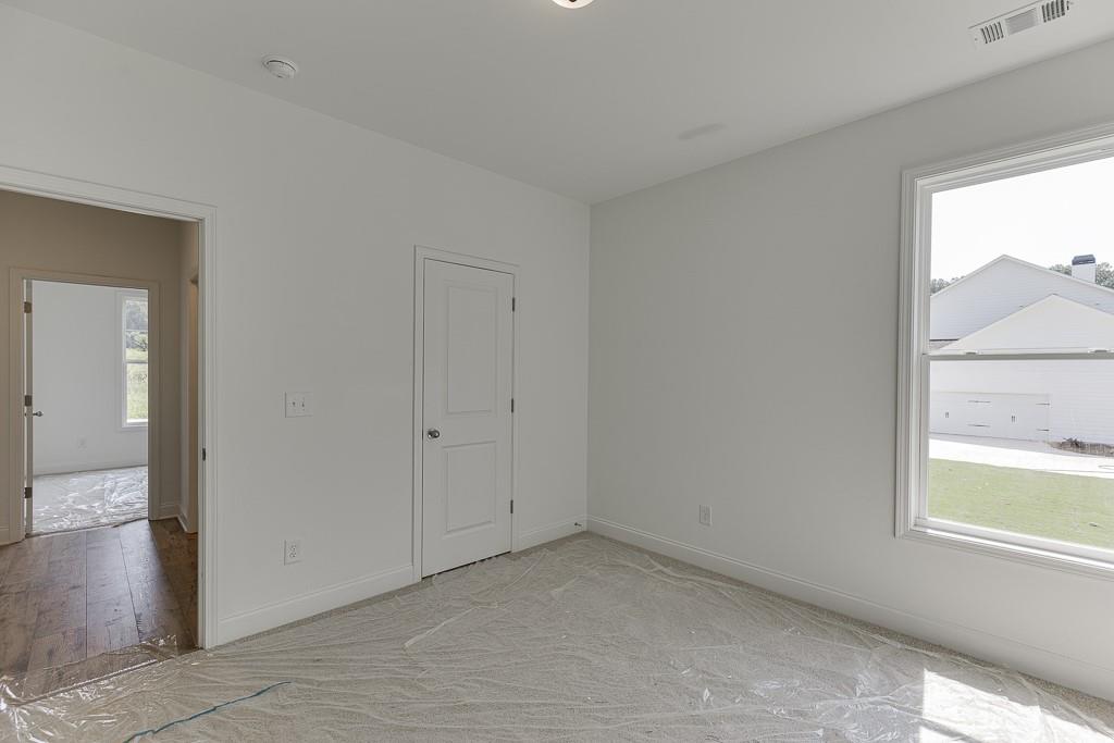 1123 Poppy Lane Jefferson, GA 30549 - Photo 10 of 45 a view of an empty room and window