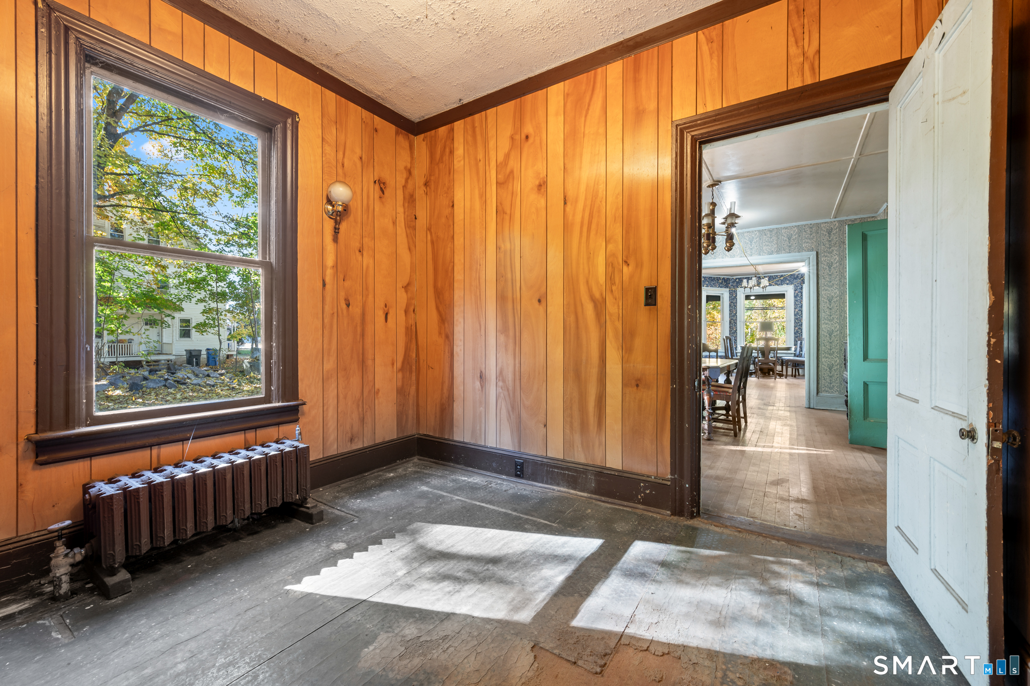 124 River Road Willington, CT 06279 - Photo 27 of 40 a view of a bedroom with wooden floor and windows