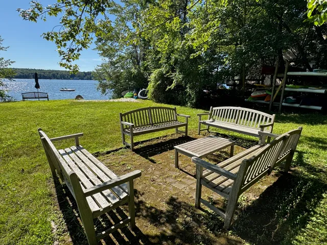 a view of a bench in a backyard
