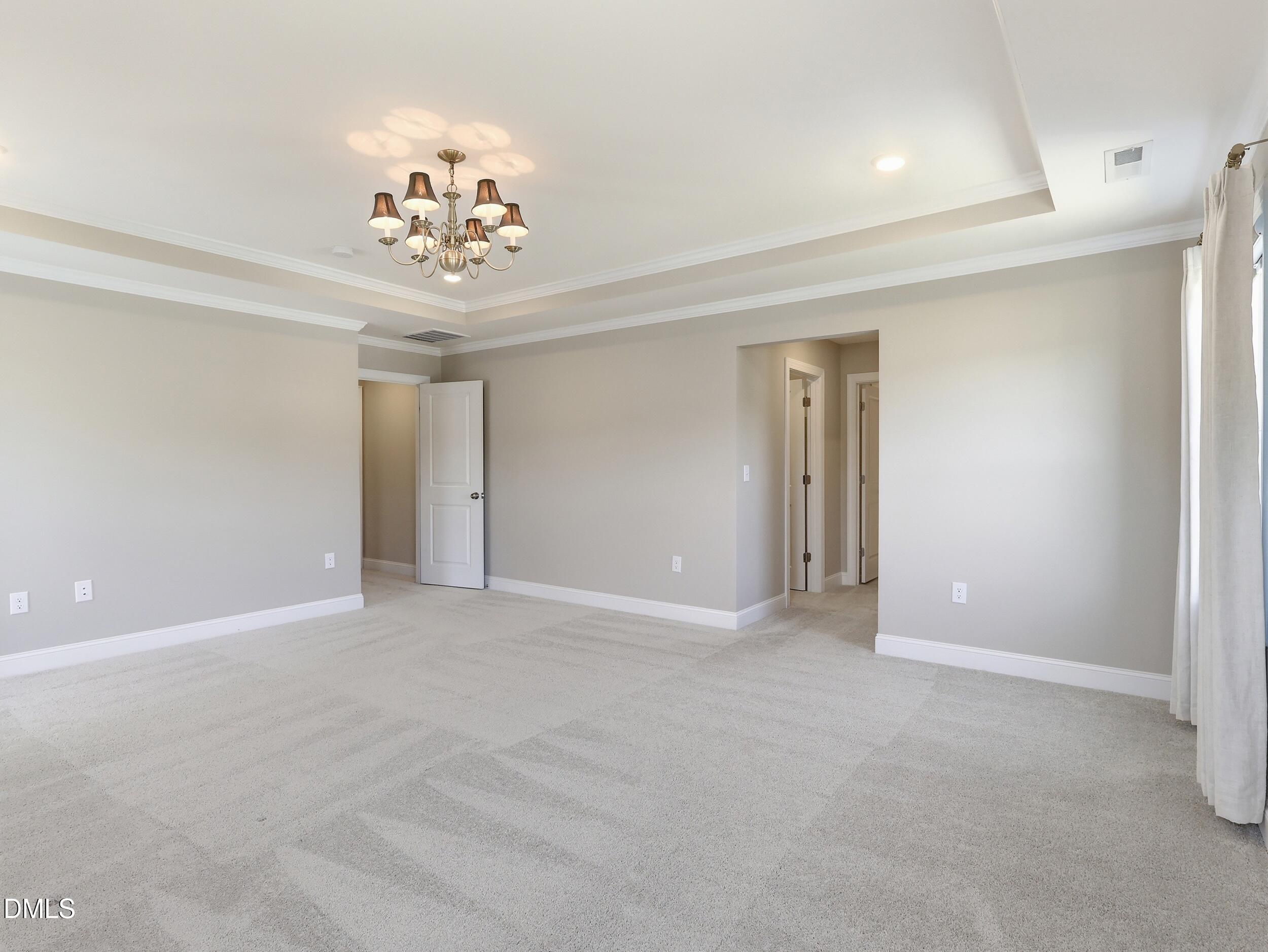 2709 Womble Ridge Drive New Hill, NC 27562 - Photo 37 of 60 a view of an empty room with a window
