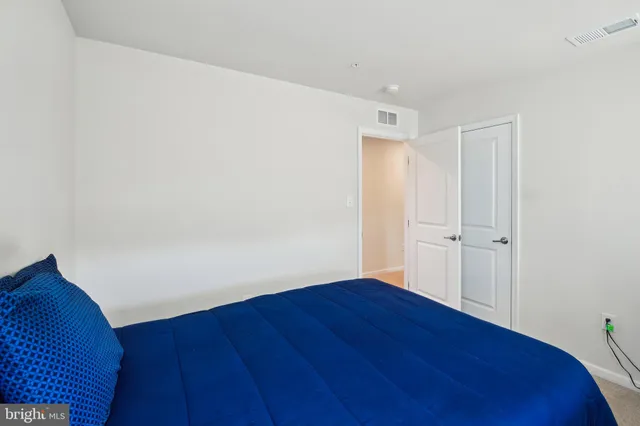 a view of hallway with wooden floor