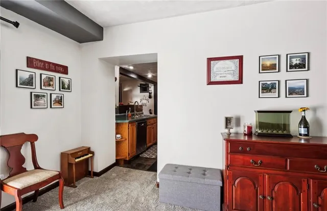 a kitchen with stainless steel appliances a refrigerator and a stove top oven
