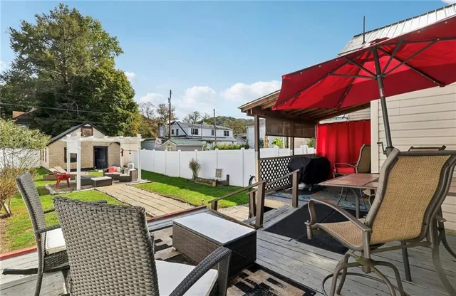 a backyard of a house with seating space