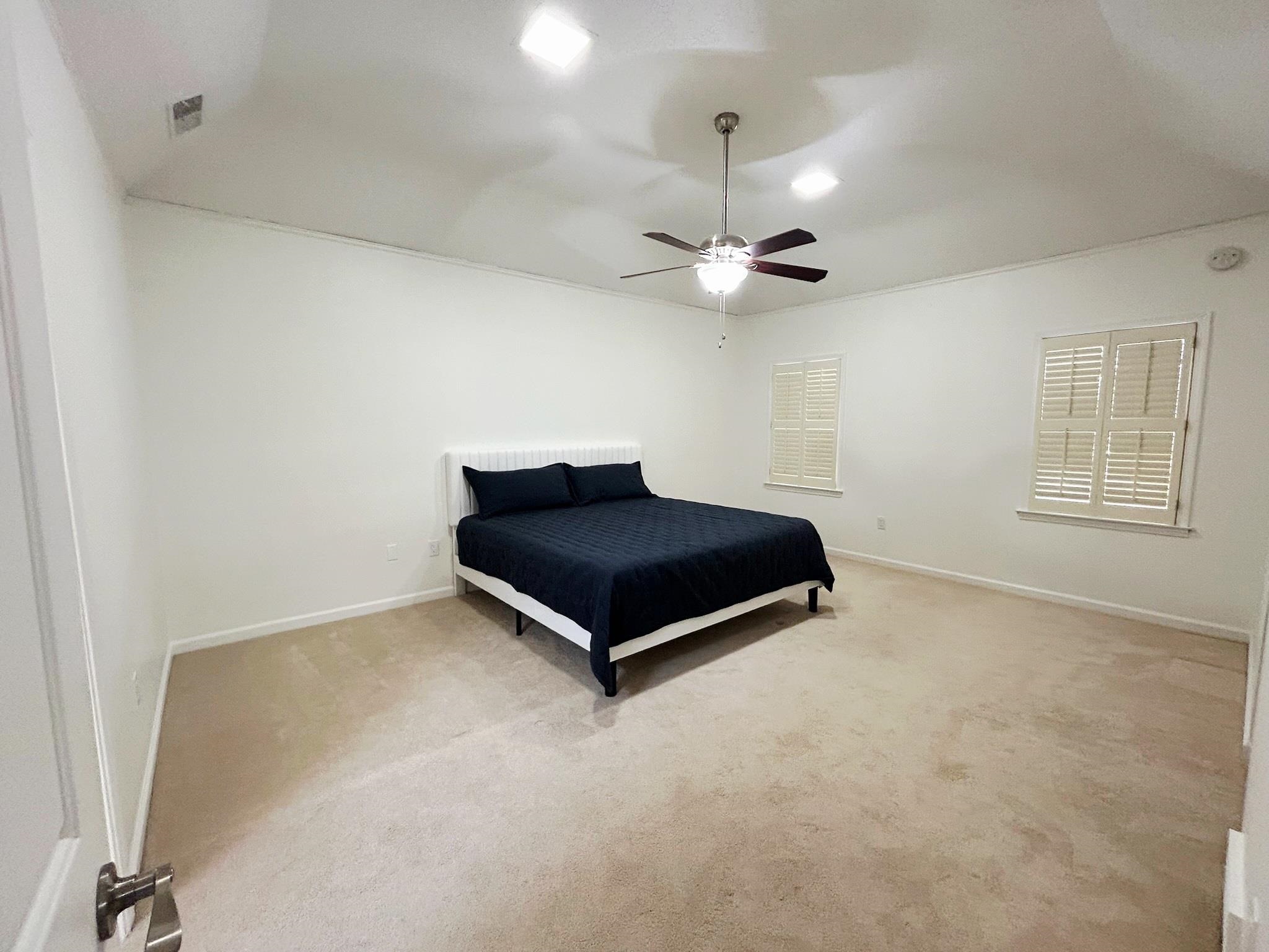 2095 Newfields Road Germantown, TN 38139 - Photo 17 of 34 Carpeted bedroom featuring ceiling fan and lofted ceiling