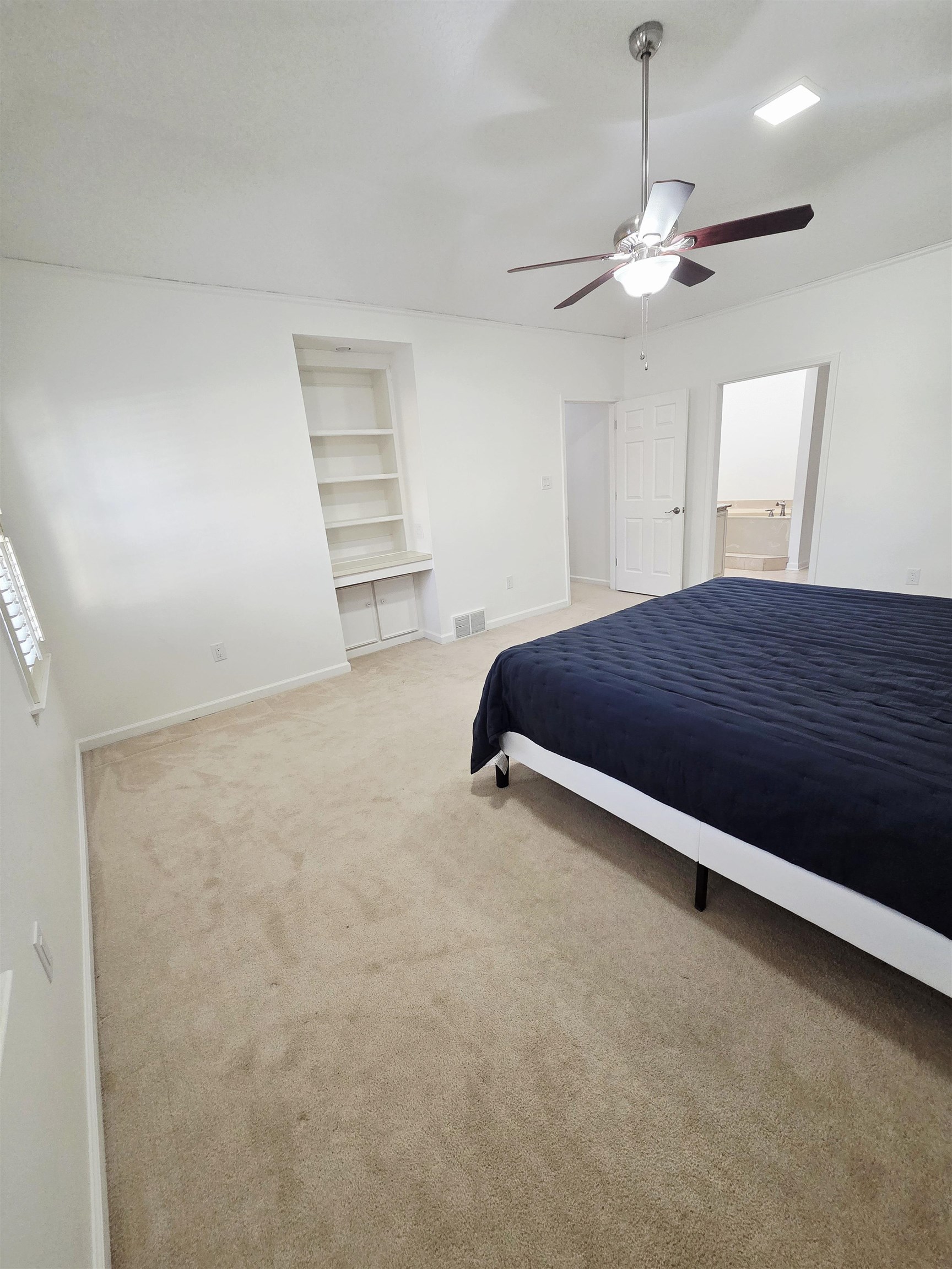 2095 Newfields Road Germantown, TN 38139 - Photo 18 of 34 Carpeted bedroom with a ceiling fan and baseboards