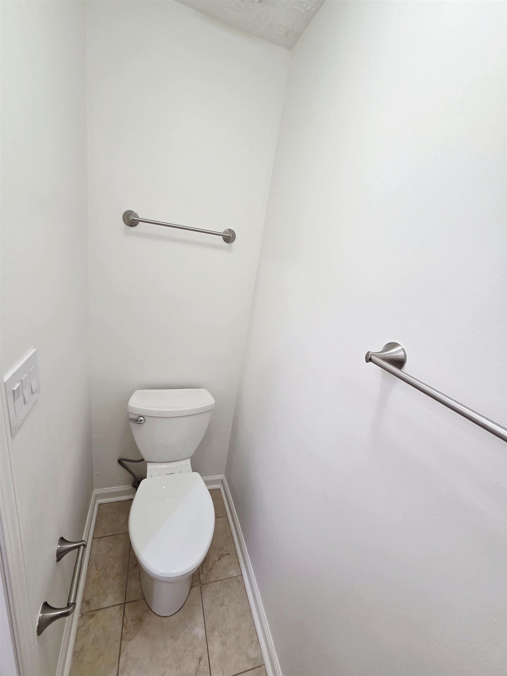 2095 Newfields Road Germantown, TN 38139 - Photo 23 of 34 Bathroom featuring toilet and light tile patterned flooring