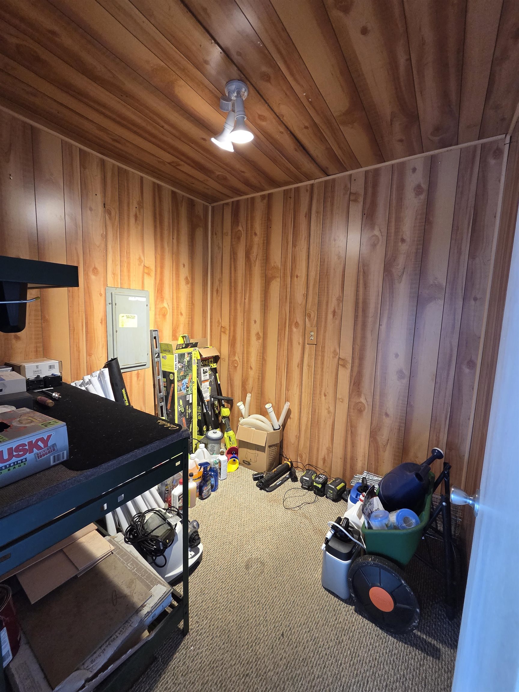 2095 Newfields Road Germantown, TN 38139 - Photo 32 of 34 Bedroom with wood ceiling, wooden walls, electric panel, carpet flooring, and a sauna