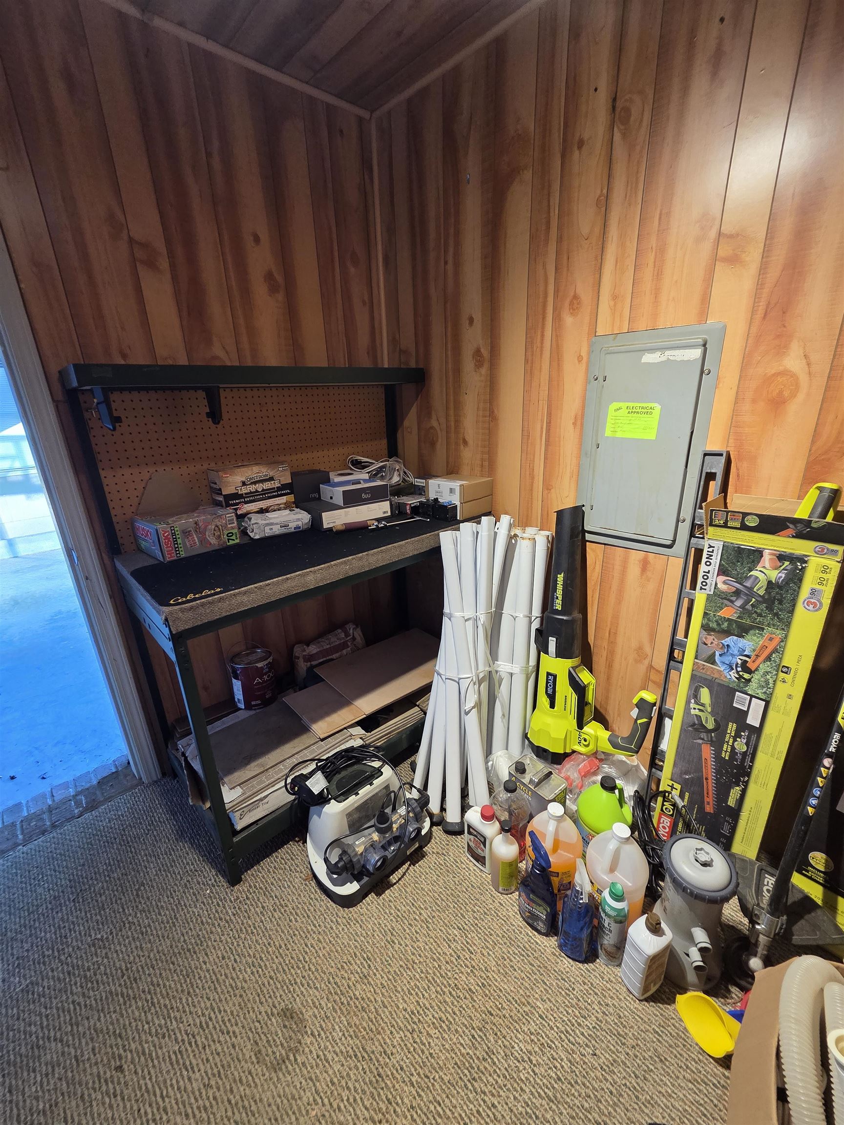 2095 Newfields Road Germantown, TN 38139 - Photo 33 of 34 Carpeted bedroom with wood walls and electric panel