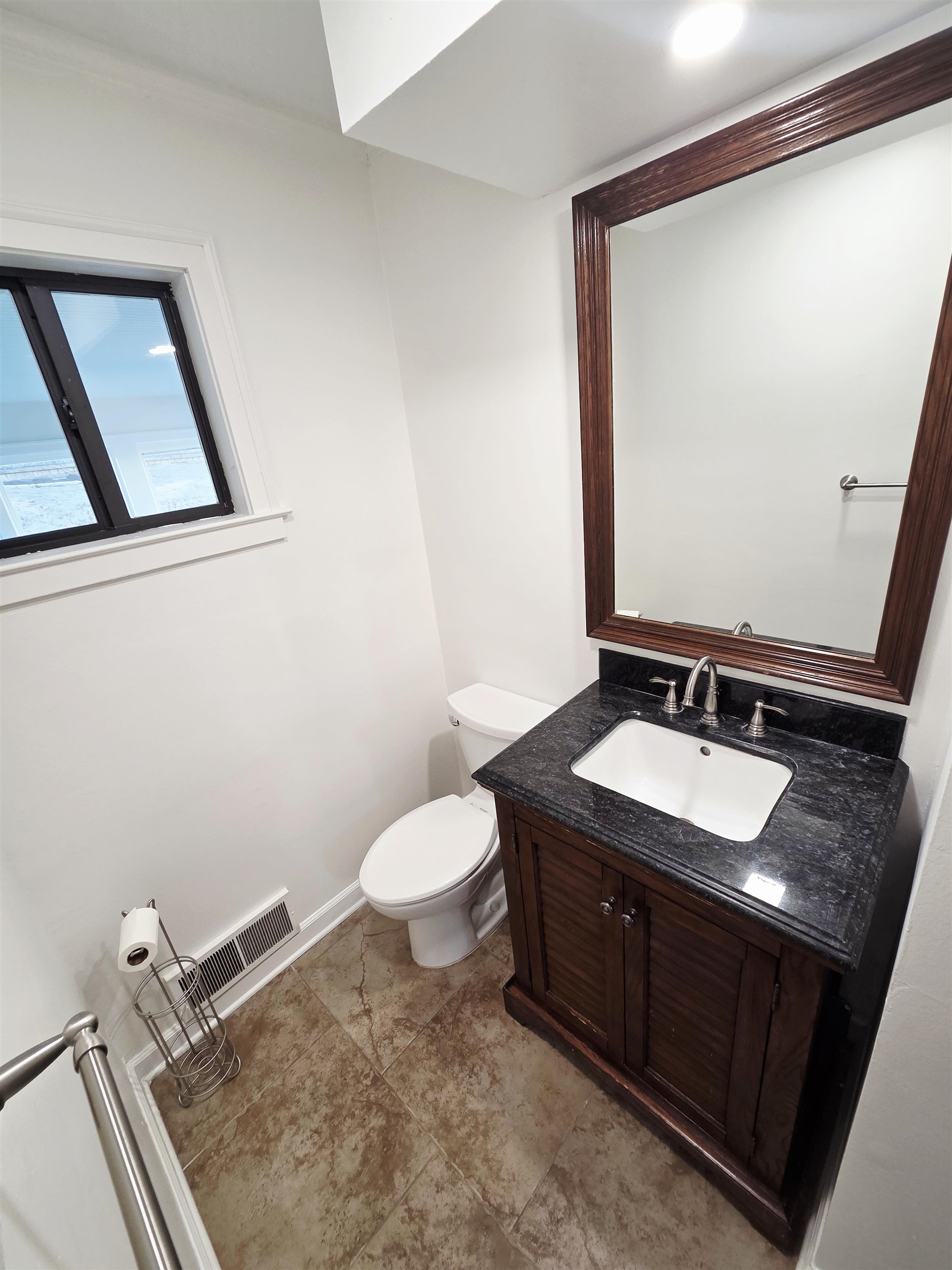 2095 Newfields Road Germantown, TN 38139 - Photo 9 of 34 Half bathroom with vanity and toilet