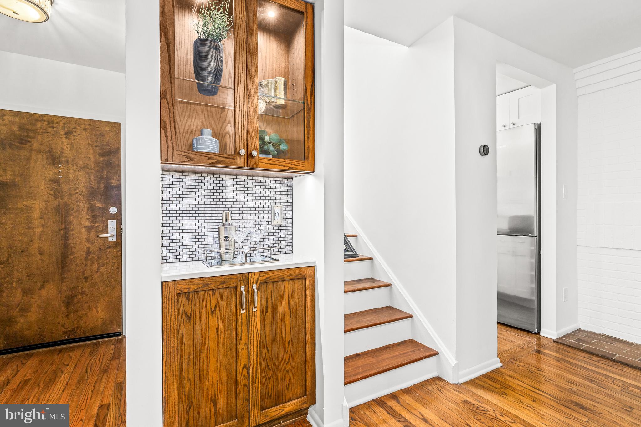 1730 16th Street Northwest, Unit 14 Washington, DC 20009 - Photo 12 of 30 a view of a hallway with wooden floor and windows